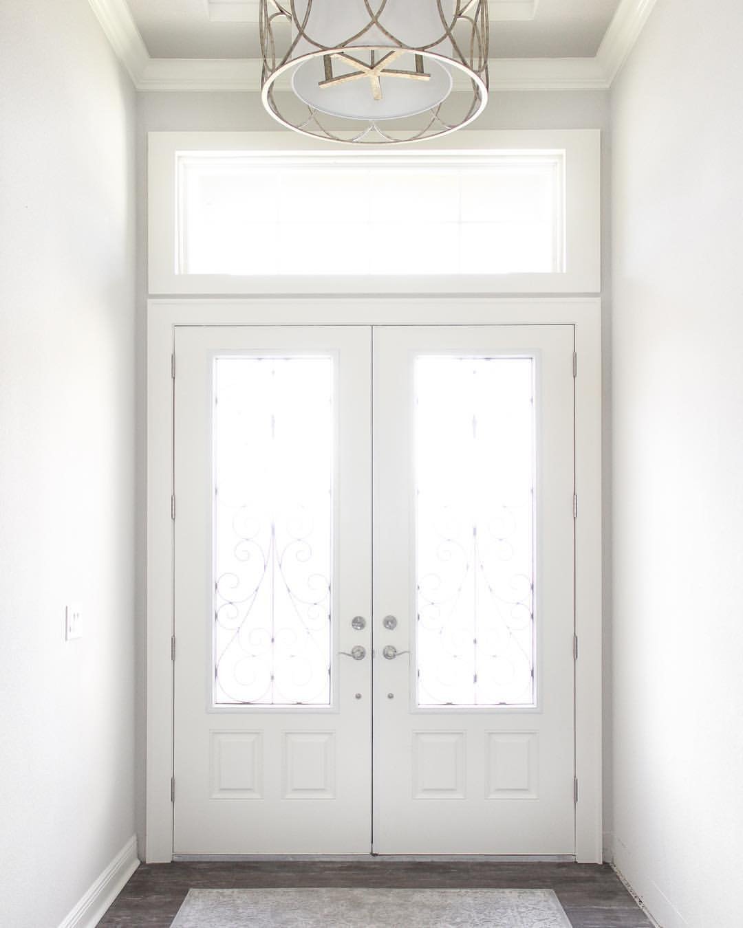 Classic Double Door with Ornate Ironwork