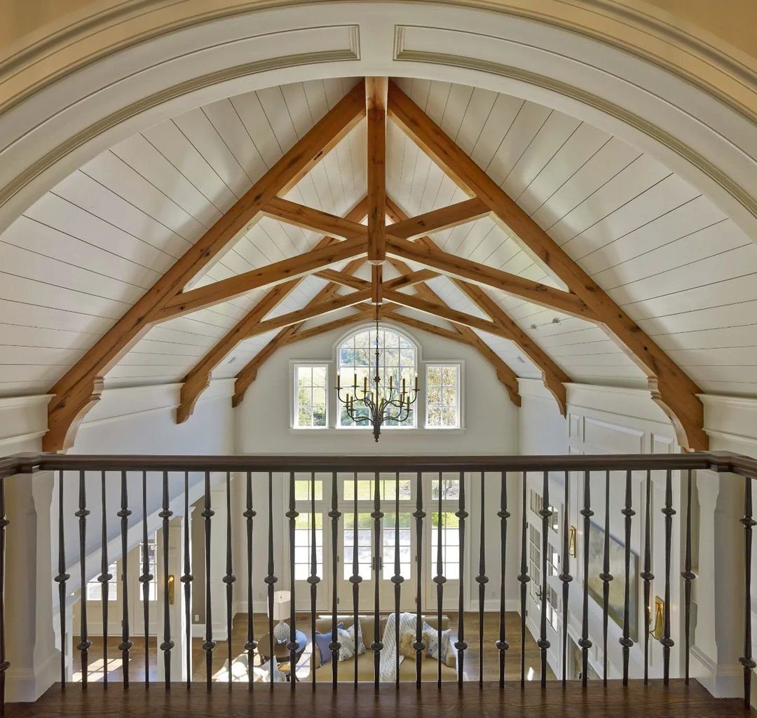 30 Jaw-Dropping Cathedral Ceiling Designs for 2025 20 Majestic Hallway with Vaulted Cathedral Ceiling