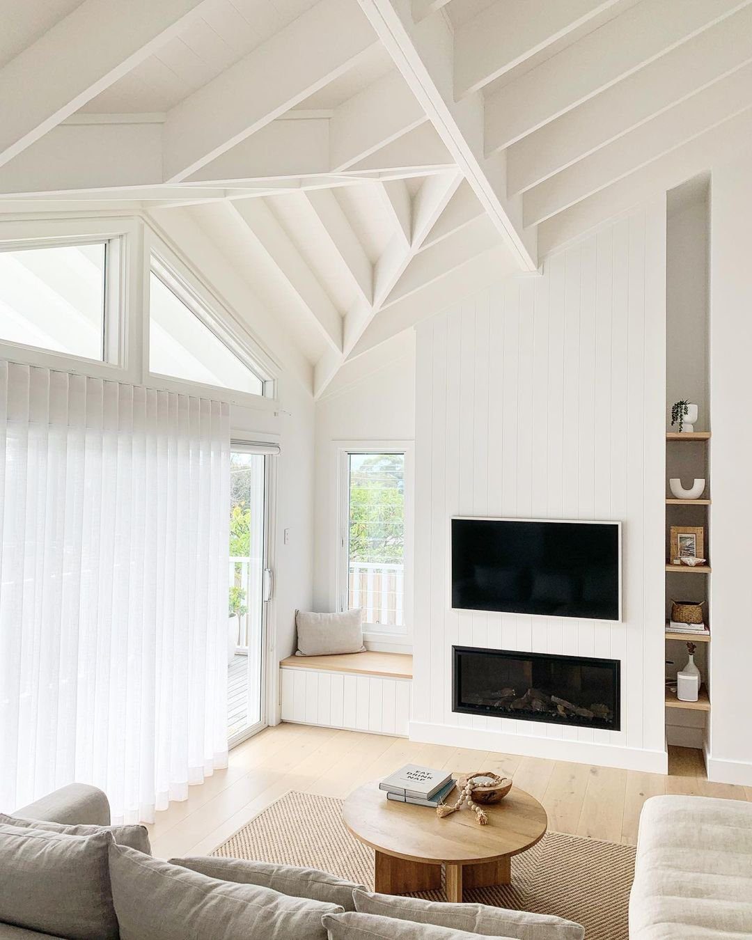 30 Jaw-Dropping Cathedral Ceiling Designs for 2025 25 Bright Living Room with White Cathedral Ceiling
