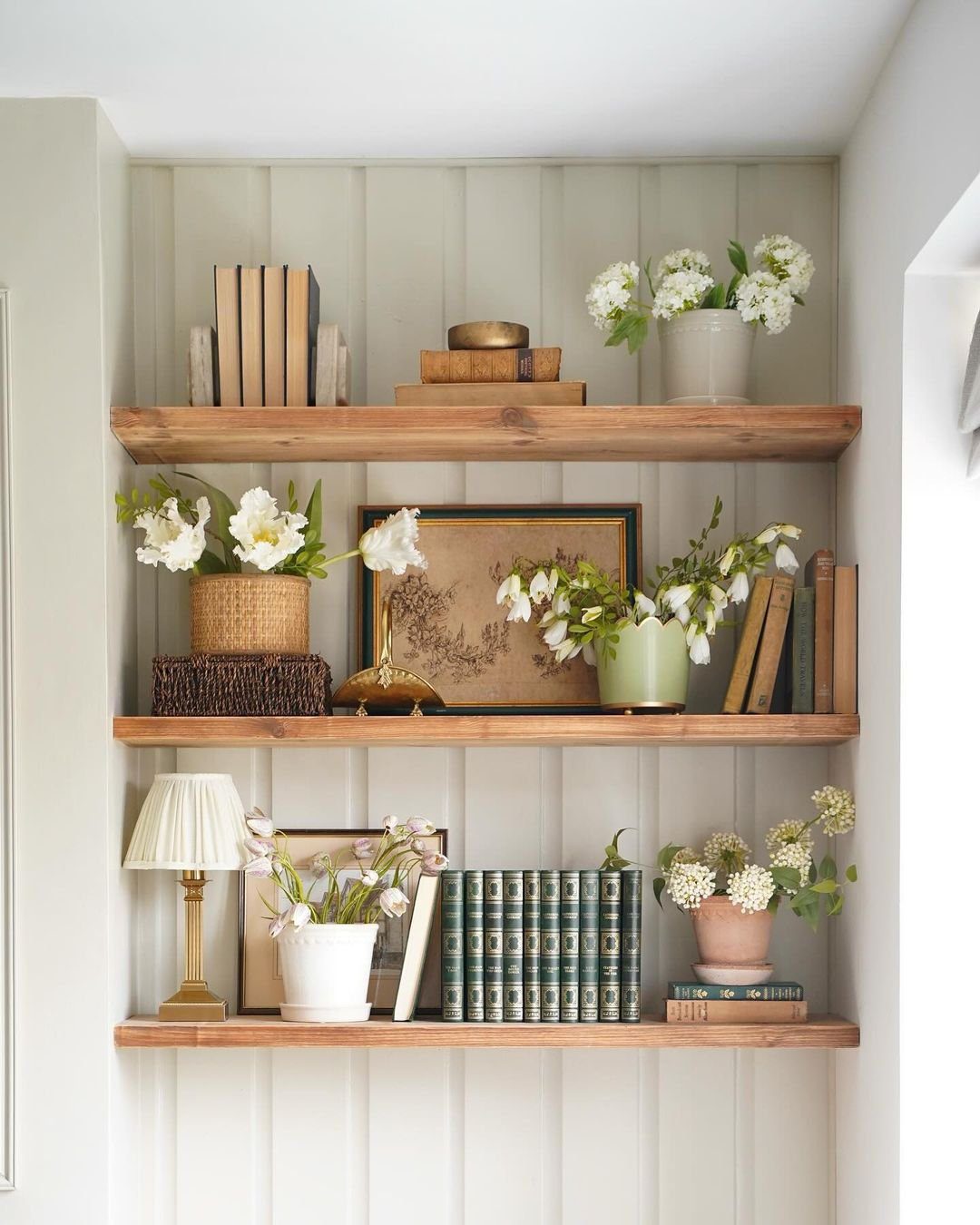 25 Stunning Floating Shelves That Wow in 2025 21 Serene Sanctuary with Floating Bookshelves
