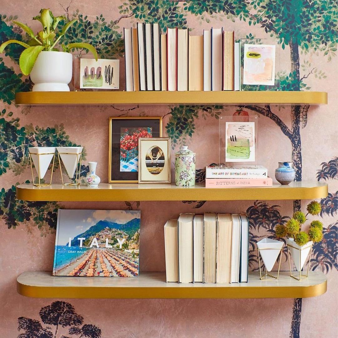 25 Stunning Floating Shelves That Wow in 2025 5 5. Artistic Expression with Floating Shelves