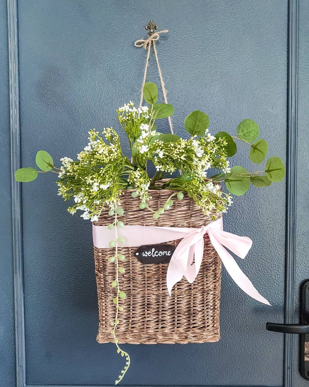25 Stunning Door Baskets That'll Make Jaws Drop in 2025 16 16. Welcoming Greenery and Baby's Breath Door Basket