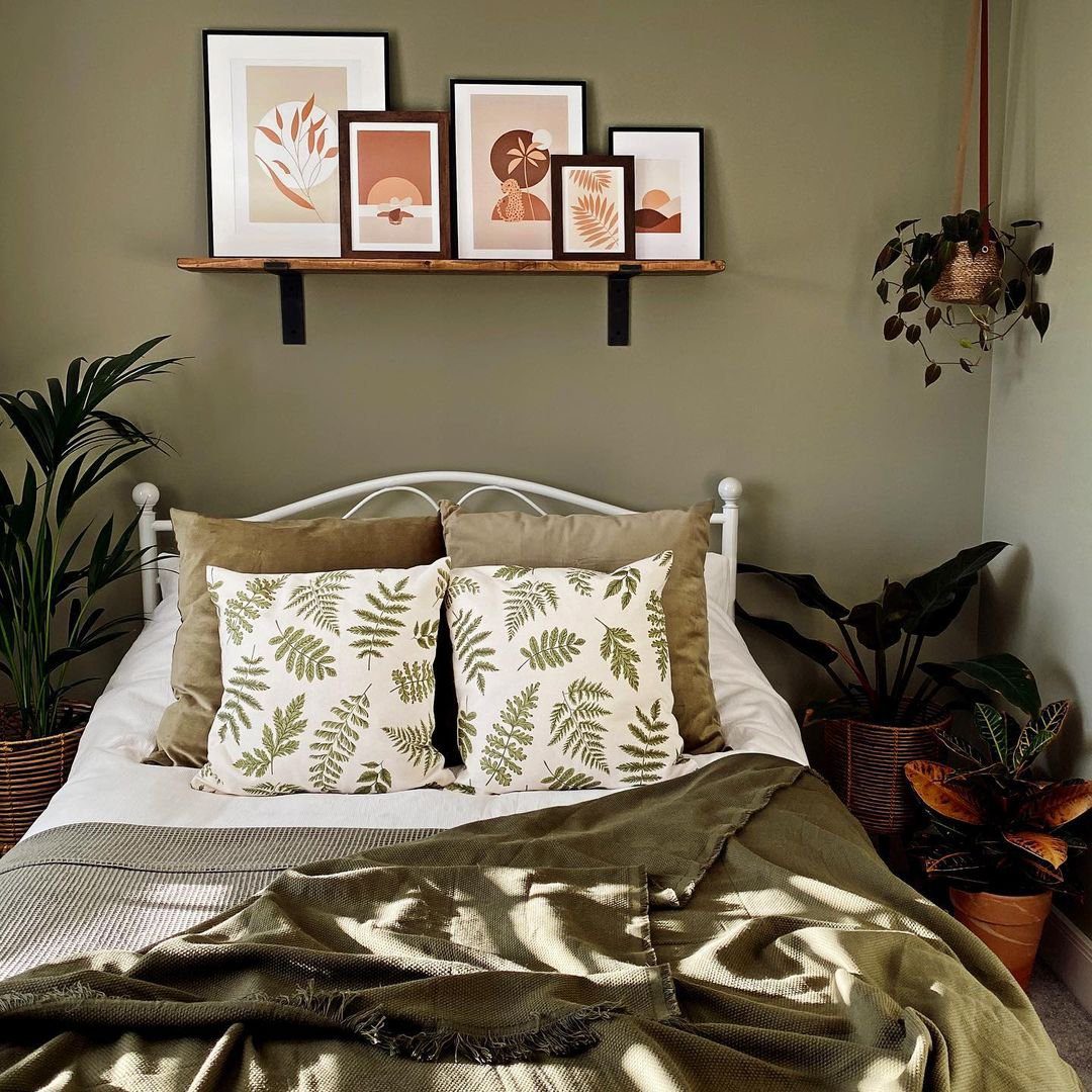 Stunning Picture Ledge Ideas That Wow in 2025! 14 Cozy Bedroom with Botanical Picture Ledge Display