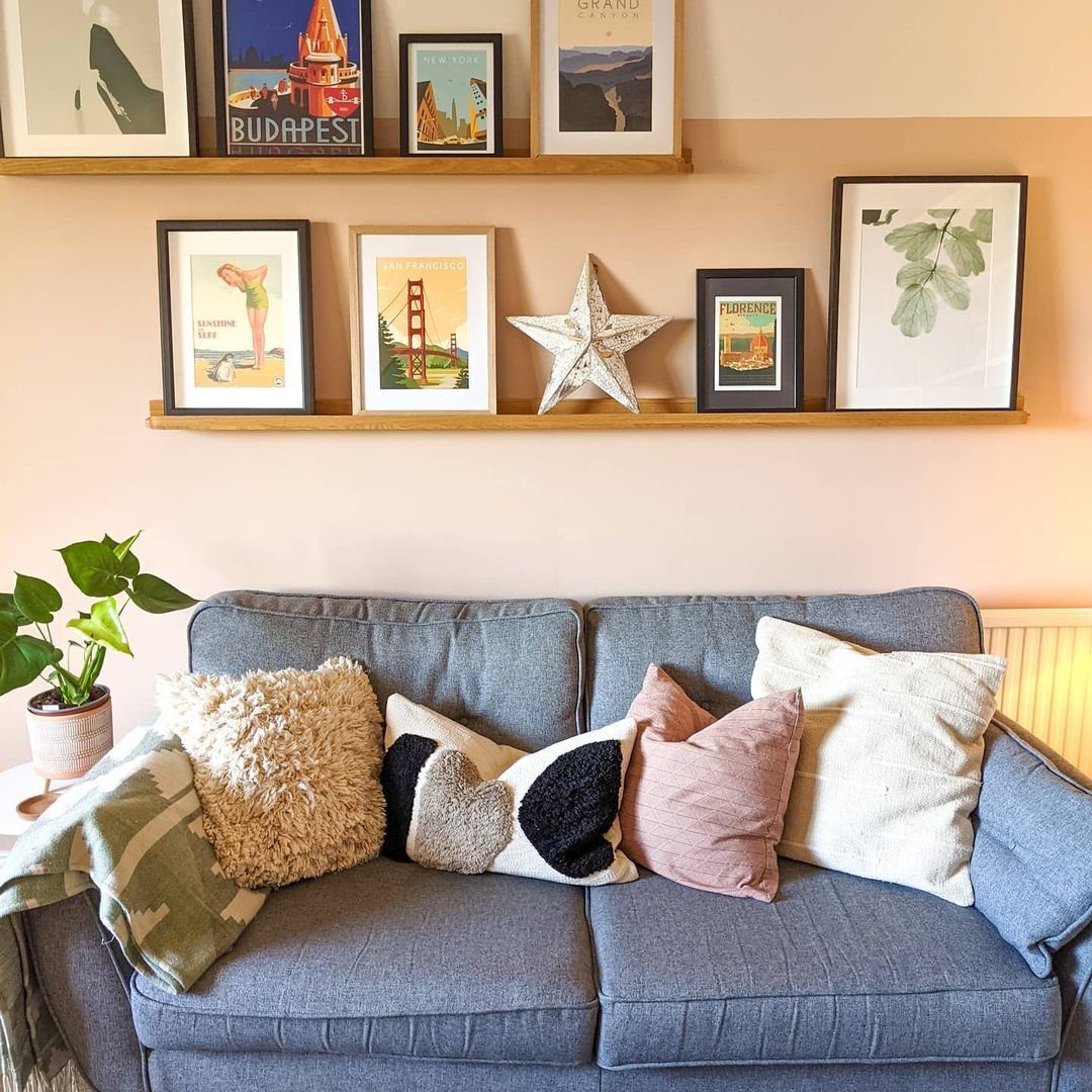 Stunning Picture Ledge Ideas That Wow in 2025! 16 Travel-Inspired Living Room with Picture Ledge Display