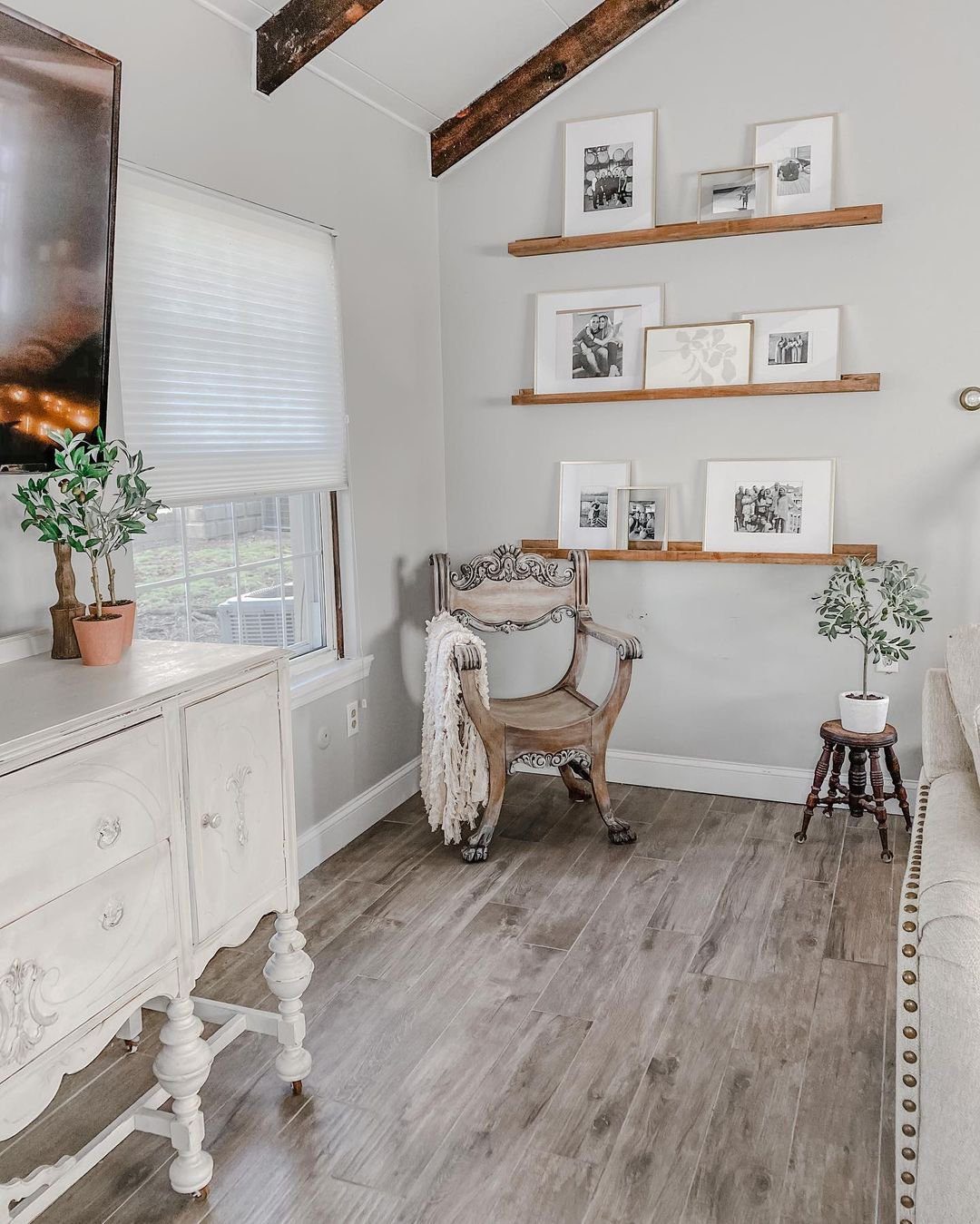Stunning Picture Ledge Ideas That Wow in 2025! 19 Rustic Living Room with Family-Focused Picture Ledge Display