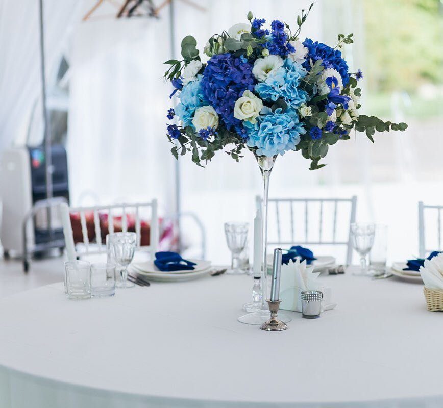Stunning Blue Centerpieces That Will Blow Your Mind 2025 15 15. Tall Blue and White Floral Centerpiece