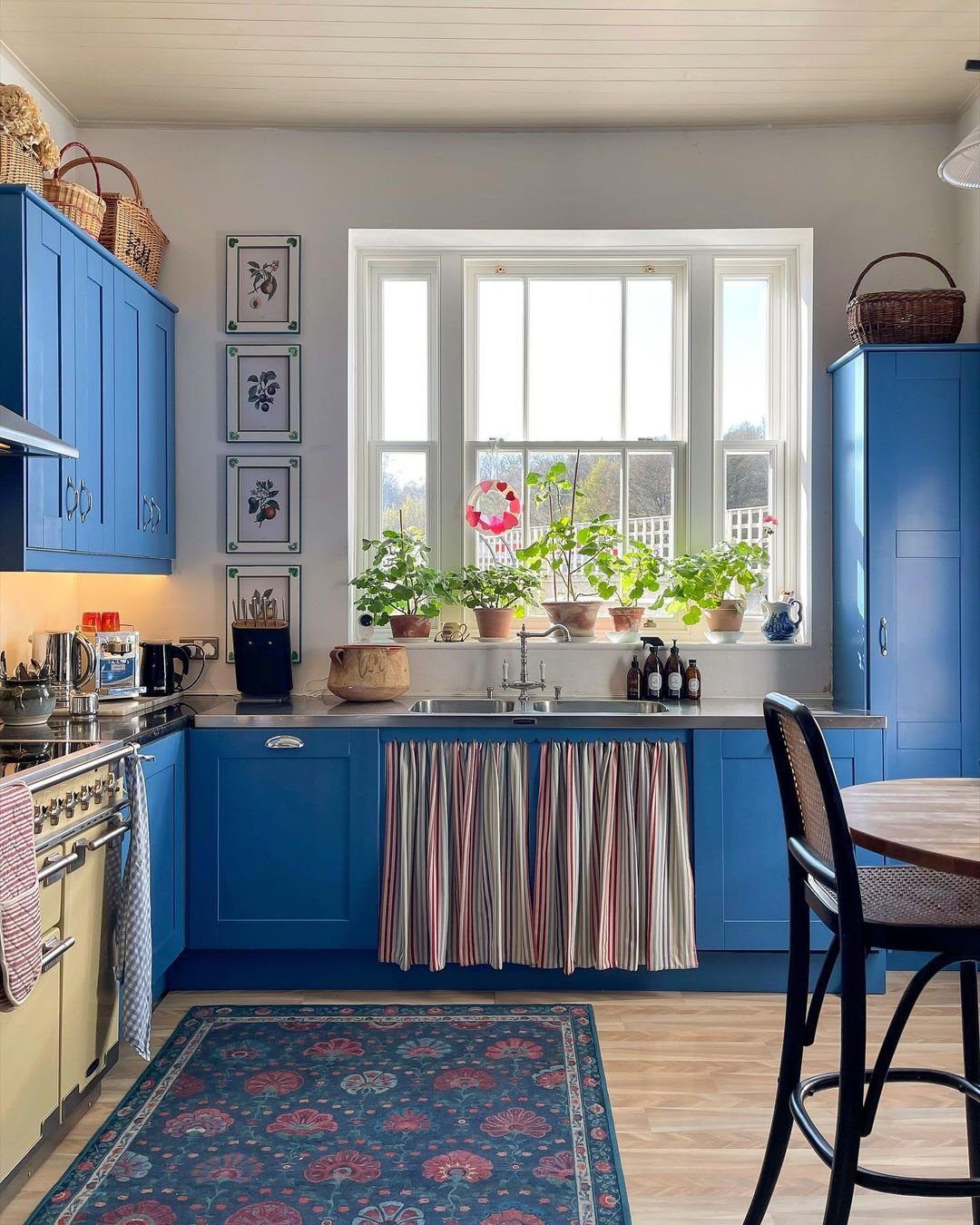 25 Mind-Blowing Dopamine Decor Kitchen Hacks for 2025 22 Cozy Cottage Charm With Classic Blues And Gallery Wall