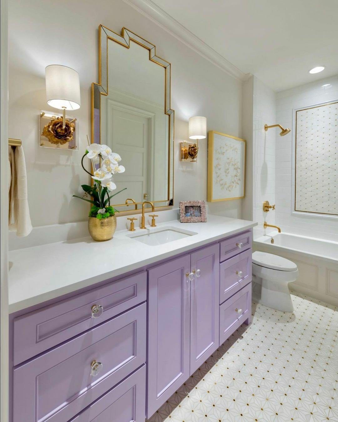 Jaw-Dropping Purple Bathroom Trends for 2025 11 Lavender Vanity With Golden Accents