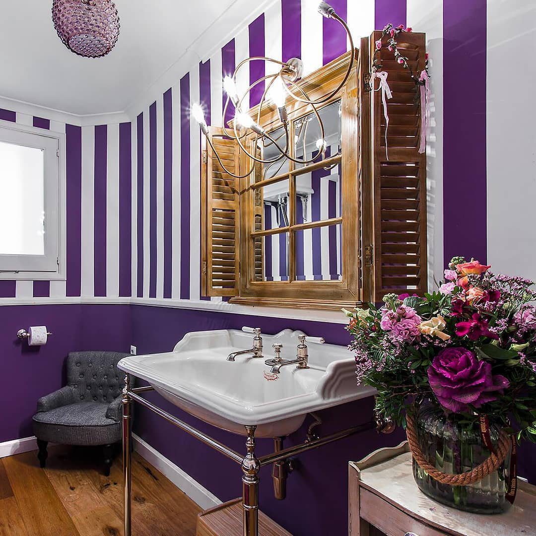 Jaw-Dropping Purple Bathroom Trends for 2025 3 Bold Stripes And Rustic Charm