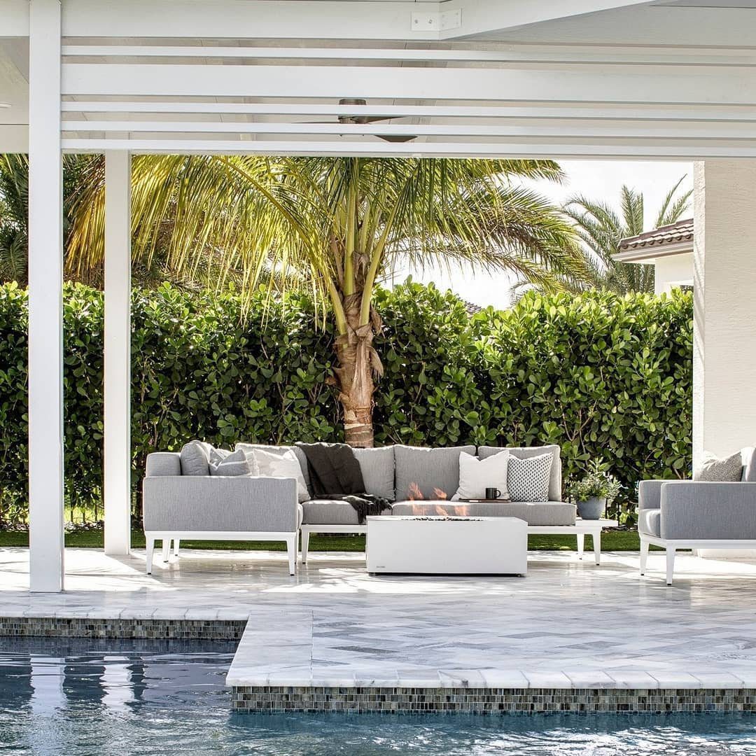 25 Jaw-Dropping Coastal Pool Decor Ideas for 2025 12 Minimalist Elegance For Poolside Comfort