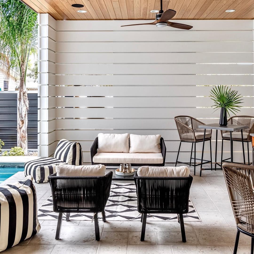 25 Jaw-Dropping Coastal Pool Decor Ideas for 2025 8 Modern Contrast With Bold Stripes