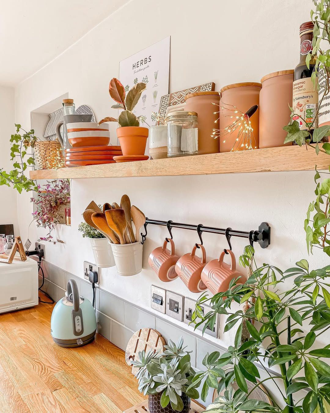 25 Stunning Kitchen Shelf Hacks You Need in 2025! 1 Warm Terracotta Accents For Cozy Shelving