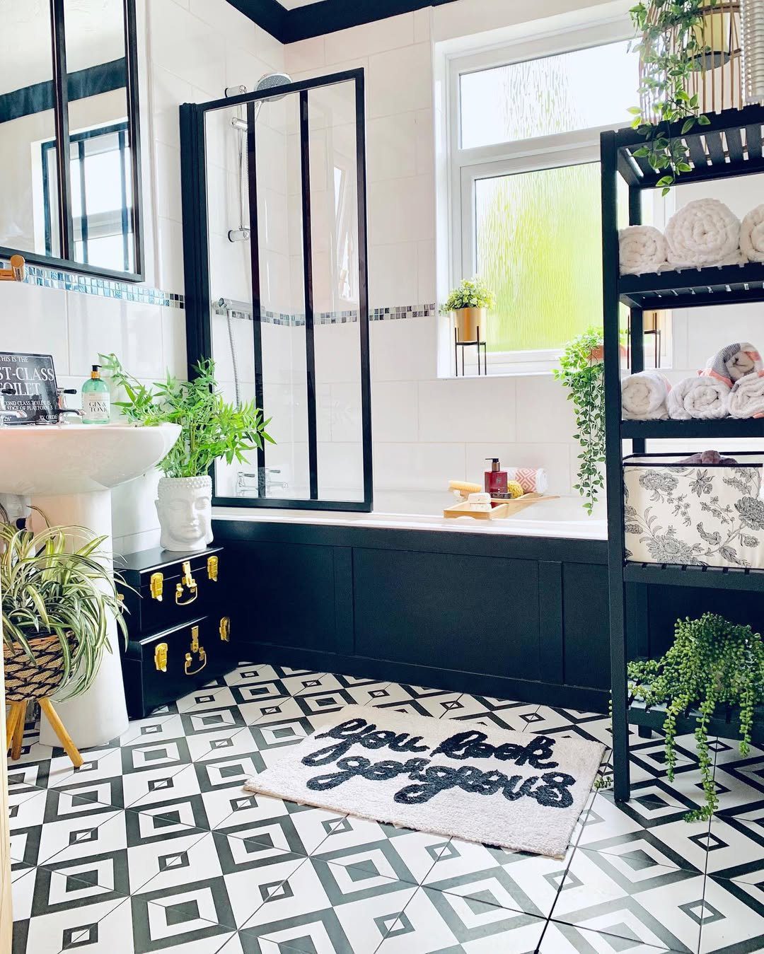 25 Mind-Blowing Eclectic Bathroom Designs for 2025 13 Monochrome Elegance With A Playful Edge