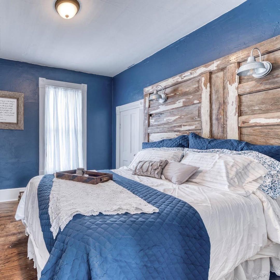 25 Dreamy Farmhouse Bedrooms You'll Obsess Over (2025) 18 Rustic Farmhouse With Bold Blues