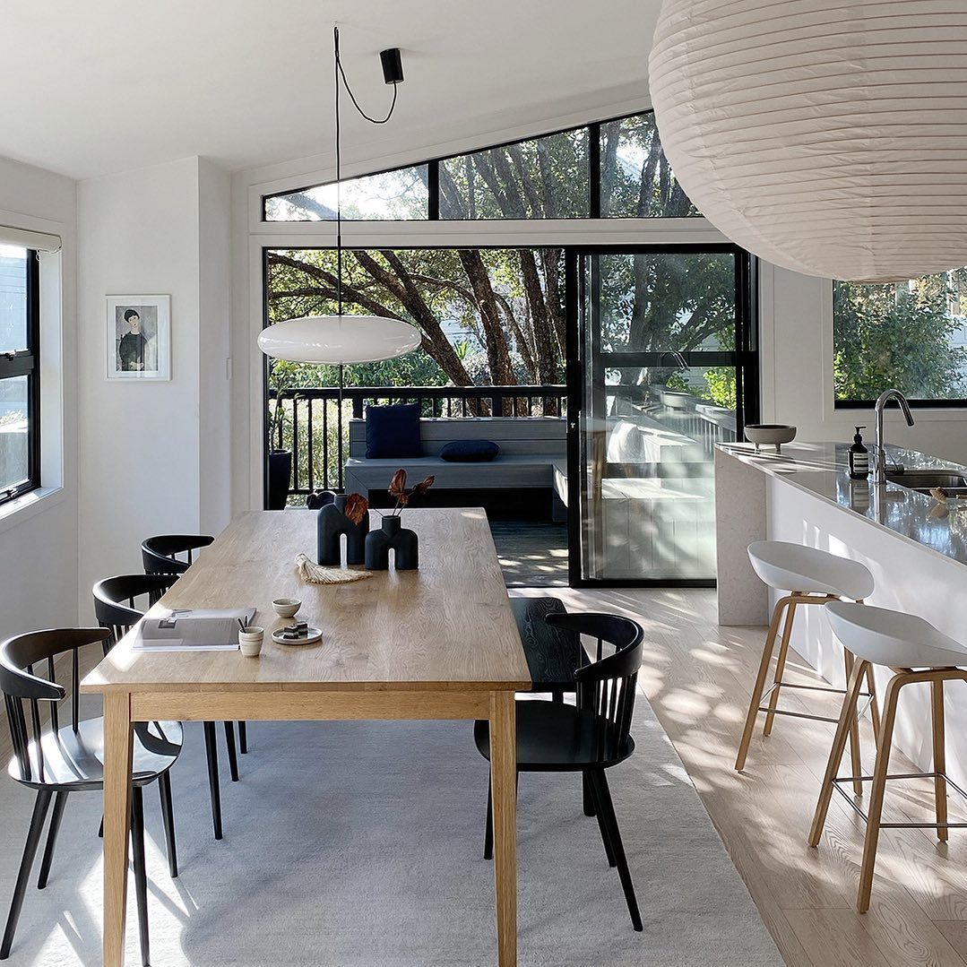 Stunning Sun-Soaked Dining Rooms for 2025! 16 16. A Sunlit Sanctuary Of Modern Simplicity