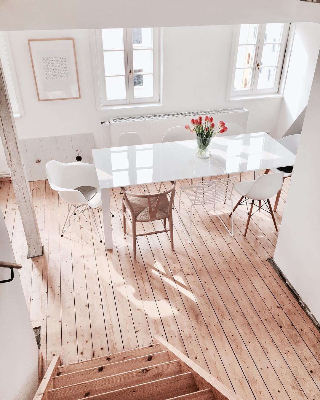 Stunning Sun-Soaked Dining Rooms for 2025! 23 A Sunlit Scandinavian Dining Simplicity