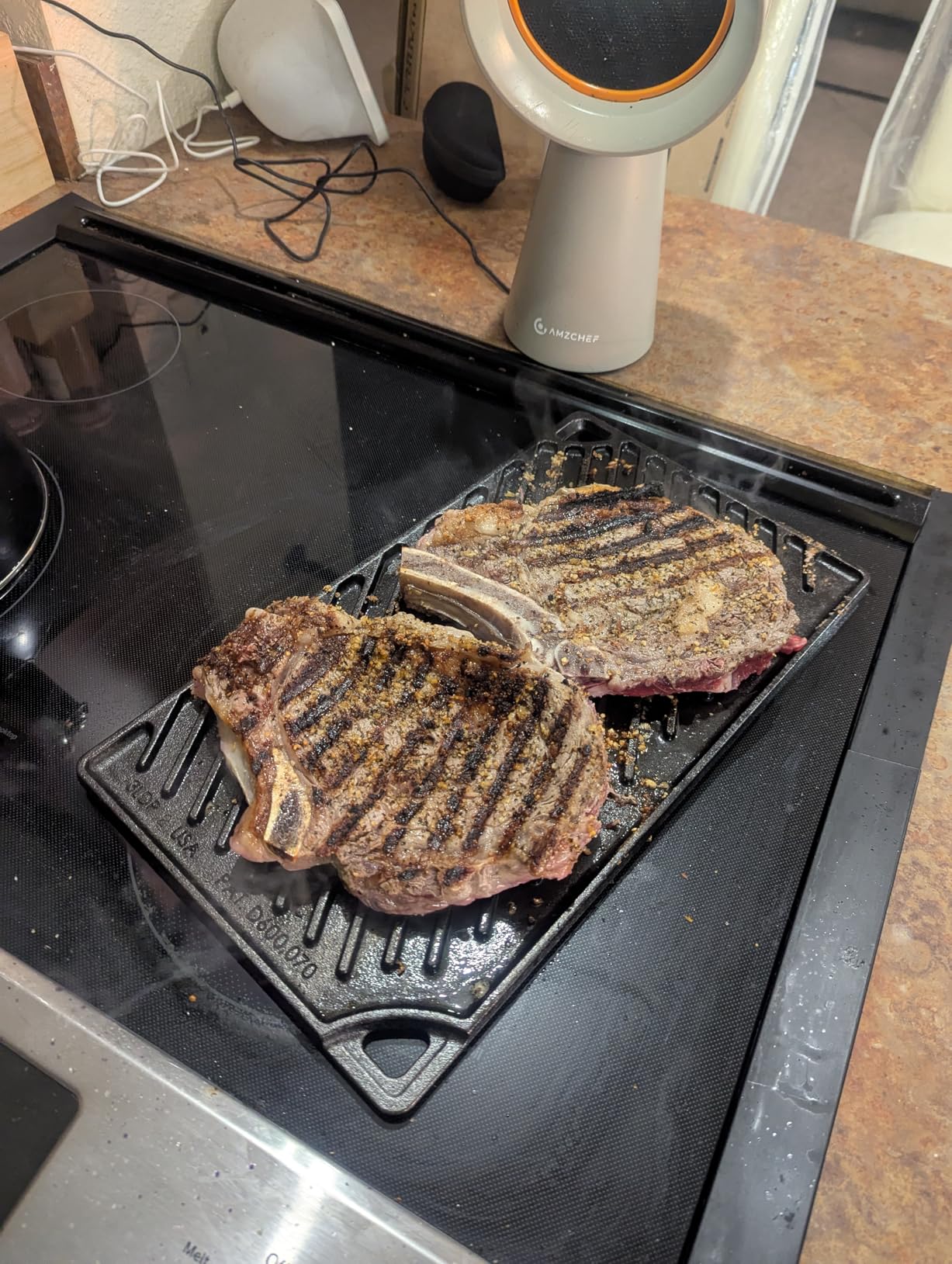 Lodge Reversible Cast Iron Grill/Griddle – 9.5 x 16.75 Inch Pre-Seasoned Cooking Surface – Flat & Ribbed Sides – Use on Stove, Grill, or Campfire – Made in the USA – Heavy-Duty, Black Customer Review Lodge Reversible Cast Iron Grill/Griddle – 9.5 x 16.75 Inch Pre-Seasoned Cooking Surface – Flat & Ribbed Sides – Use on Stove, Grill, or Campfire – Made in the USA – Heavy-Duty, Black - Customer Photo 1