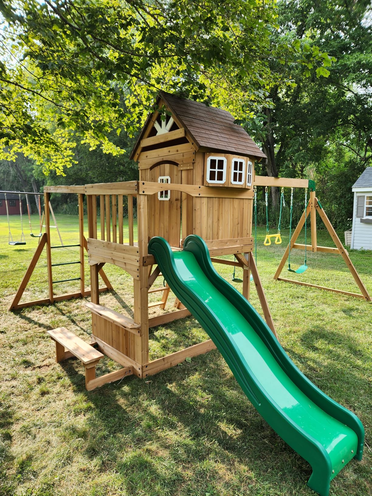 Backyard Discovery Montpelier Cedar Wood Swing Set with Wave Slide,Clubhouse, Monkey Bars, Picnic Area, Snack Bar, Belt Swings, Trapeze, Balcony, Playhouse, Working Door, Ladder, Outdoor Playset Customer Review Backyard Discovery Montpelier Cedar Wood Swing Set with Wave Slide,Clubhouse, Monkey Bars, Picnic Area, Snack Bar, Belt Swings, Trapeze, Balcony, Playhouse, Working Door, Ladder, Outdoor Playset - Customer Photo 1