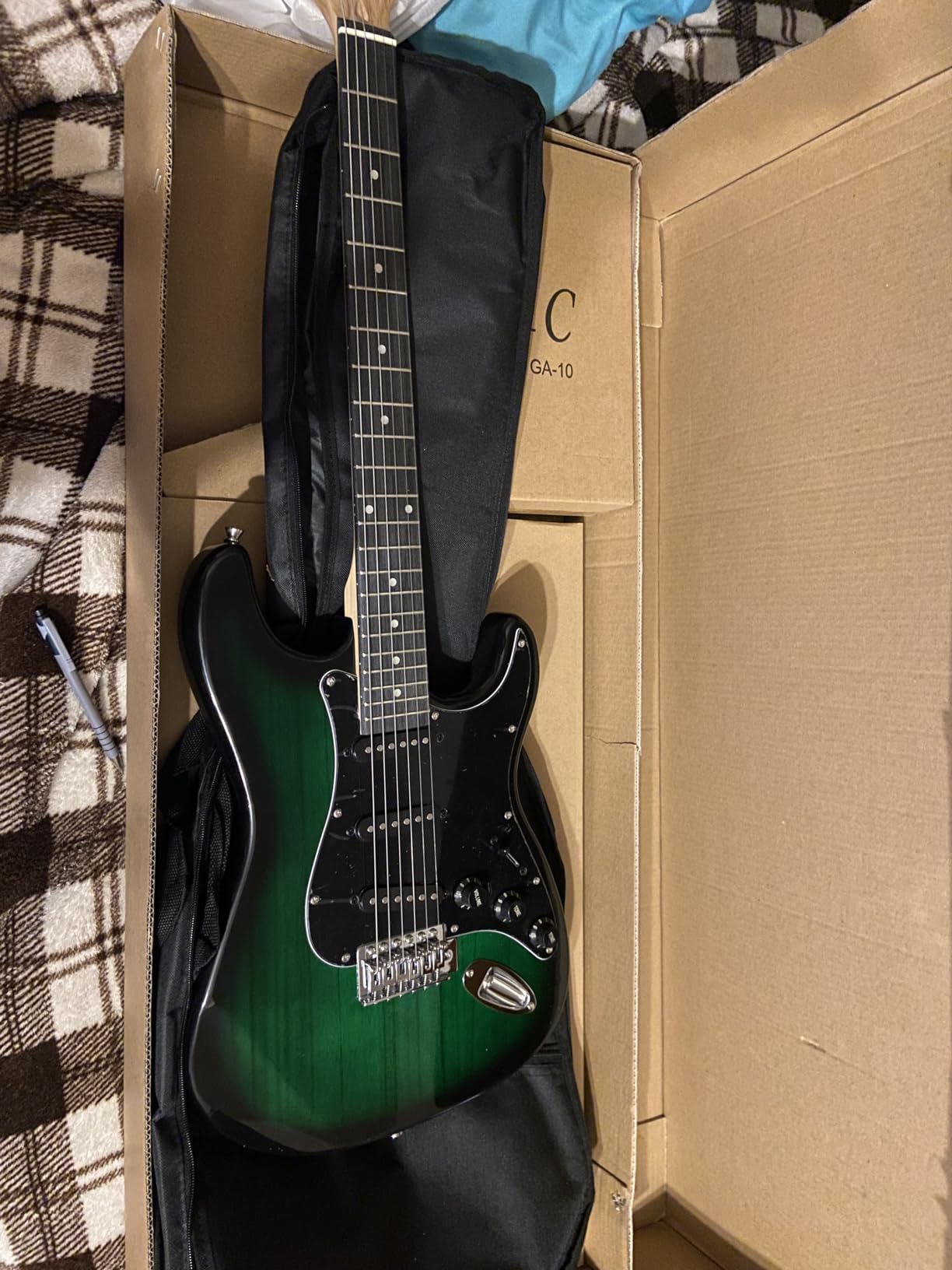 EG39-TGRB-10W Beginner Series Electric Guitar with Case, Strap, Cable, Capo, Picks, Electronic Tuner, String Winder and Polish Cloth, 10W Amp, Transparent Green/Black Picguard Customer Review EG39-TGRB-10W Beginner Series Electric Guitar with Case, Strap, Cable, Capo, Picks, Electronic Tuner, String Winder and Polish Cloth, 10W Amp, Transparent Green/Black Picguard - Customer Photo 2
