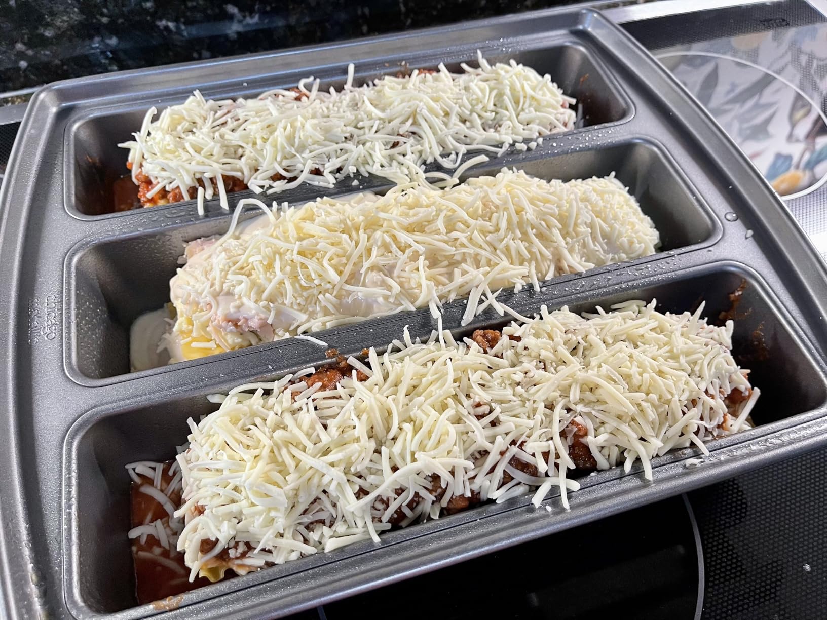 Chicago Metallic Professional Lasagna Trio Pan, Perfect for loaf breads, cakes and more 12.5 by 16 by 3 inches, Silver Customer Review Chicago Metallic Professional Lasagna Trio Pan, Perfect for loaf breads, cakes and more 12.5 by 16 by 3 inches, Silver - Customer Photo 1