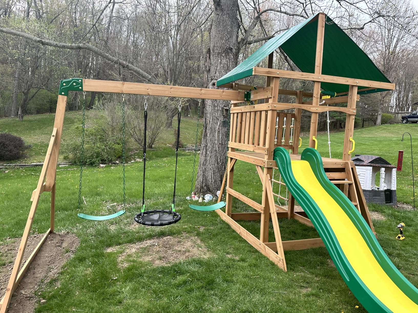 Backyard Discovery Mount Mckinley Cedar Wood Swing Set with Wave Slide, Play Deck, Double Rock Wall, Rope Ladder, Web Swing, Belt Swings, Toy Telescope, Steering Wheel, Sandbox Area, Outdoor Playset Customer Review Backyard Discovery Mount Mckinley Cedar Wood Swing Set with Wave Slide, Play Deck, Double Rock Wall, Rope Ladder, Web Swing, Belt Swings, Toy Telescope, Steering Wheel, Sandbox Area, Outdoor Playset - Customer Photo 2