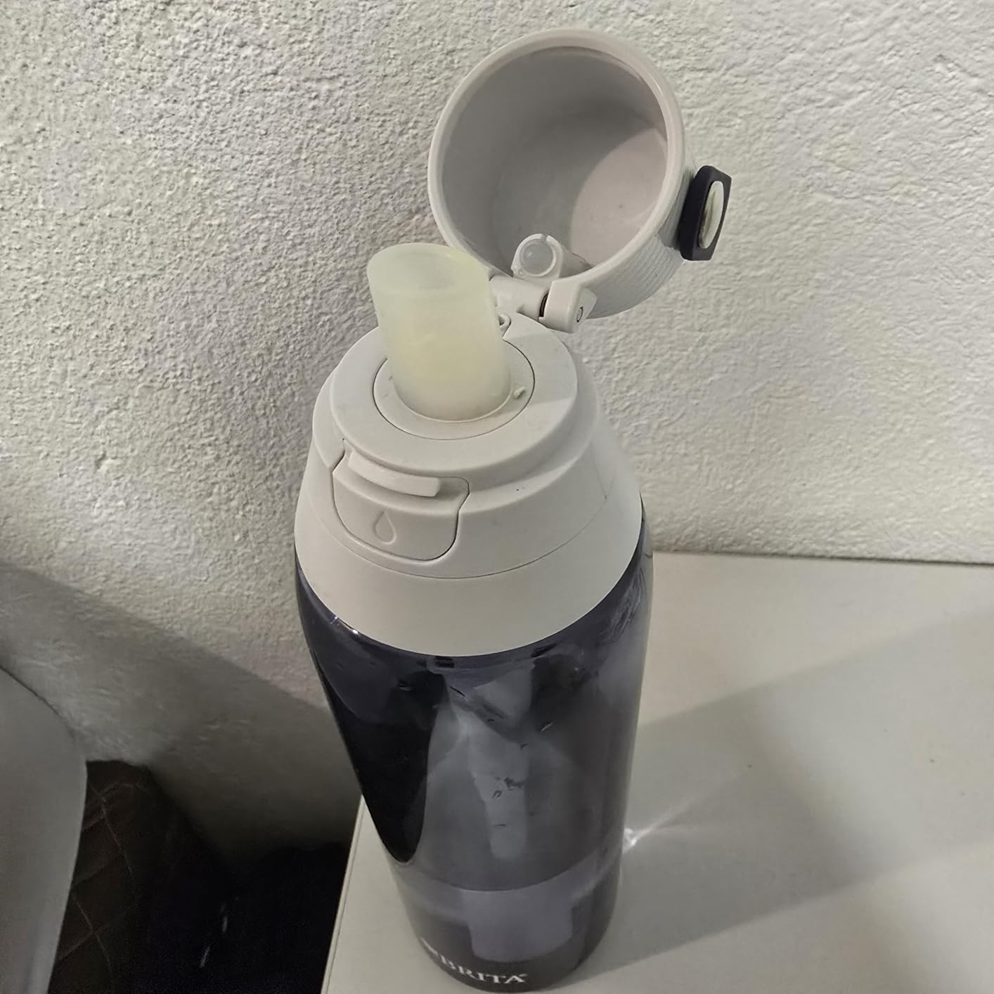 Brita Hard-Sided Plastic Premium Filtering Water Bottle, BPA-Free, Reusable, Replaces 300 Plastic Water Bottles, Filter Lasts 2 Months or 40 Gallons, Includes 1 Filter, Night Sky - 26 oz. Customer Review Brita Hard-Sided Plastic Premium Filtering Water Bottle, BPA-Free, Reusable, Replaces 300 Plastic Water Bottles, Filter Lasts 2 Months or 40 Gallons, Includes 1 Filter, Night Sky - 26 oz. - Customer Photo 1