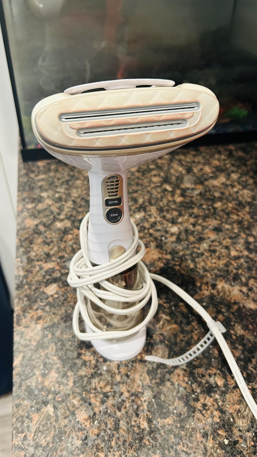 Conair Handheld Garment Steamer for Clothes, Turbo ExtremeSteam 1875W Fabric Steamer, Portable Handheld Design, Strong Penetrating Steam, White/Champagne Customer Review Conair Handheld Garment Steamer for Clothes, Turbo ExtremeSteam 1875W Fabric Steamer, Portable Handheld Design, Strong Penetrating Steam, White/Champagne - Customer Photo 1