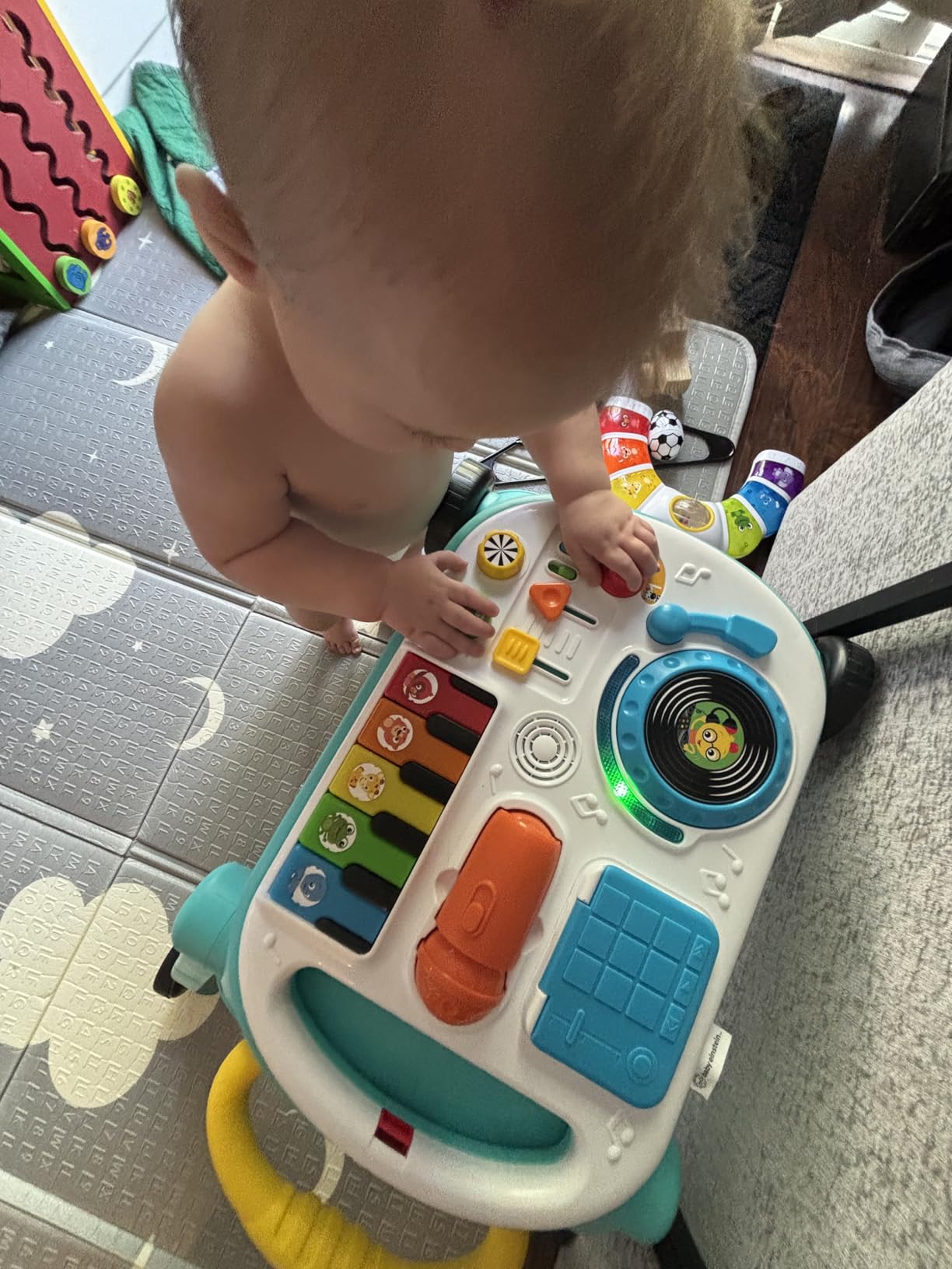 Baby Einstein Musical Mix 'N Roll Learning Walker, 4-in-1 Push Walker, Activity Center, Toddler Table & Floor Toy, 6-36 Months, Blue Customer Review Baby Einstein Musical Mix 'N Roll Learning Walker, 4-in-1 Push Walker, Activity Center, Toddler Table & Floor Toy, 6-36 Months, Blue - Customer Photo 1