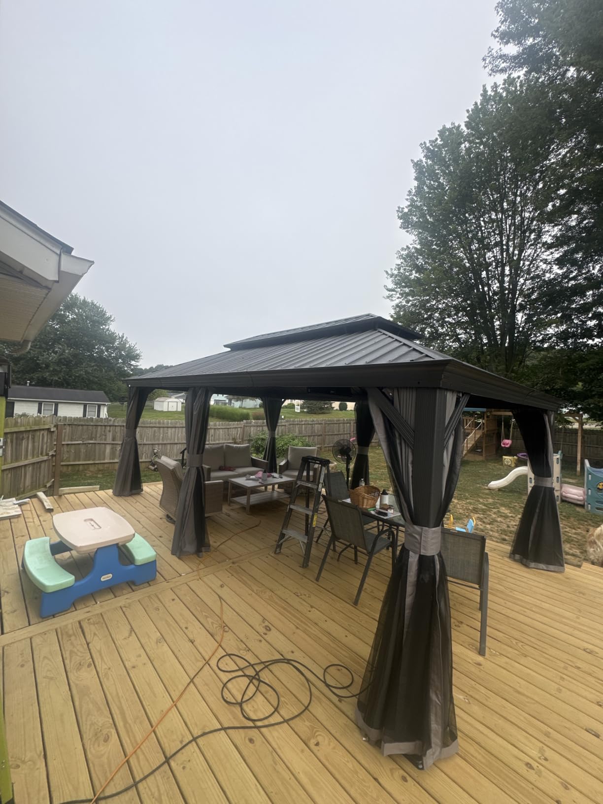 Kozyard Alexander 10' X 12' Hardtop, Aluminum Metal Gazebo with Galvanized Steel Double Roof Canopy, Curtain and Netting, Permanent Pavilion for Patio, Backyard, Deck, Lawn (Gray) Customer Review Kozyard Alexander 10' X 12' Hardtop, Aluminum Metal Gazebo with Galvanized Steel Double Roof Canopy, Curtain and Netting, Permanent Pavilion for Patio, Backyard, Deck, Lawn (Gray) - Customer Photo 1