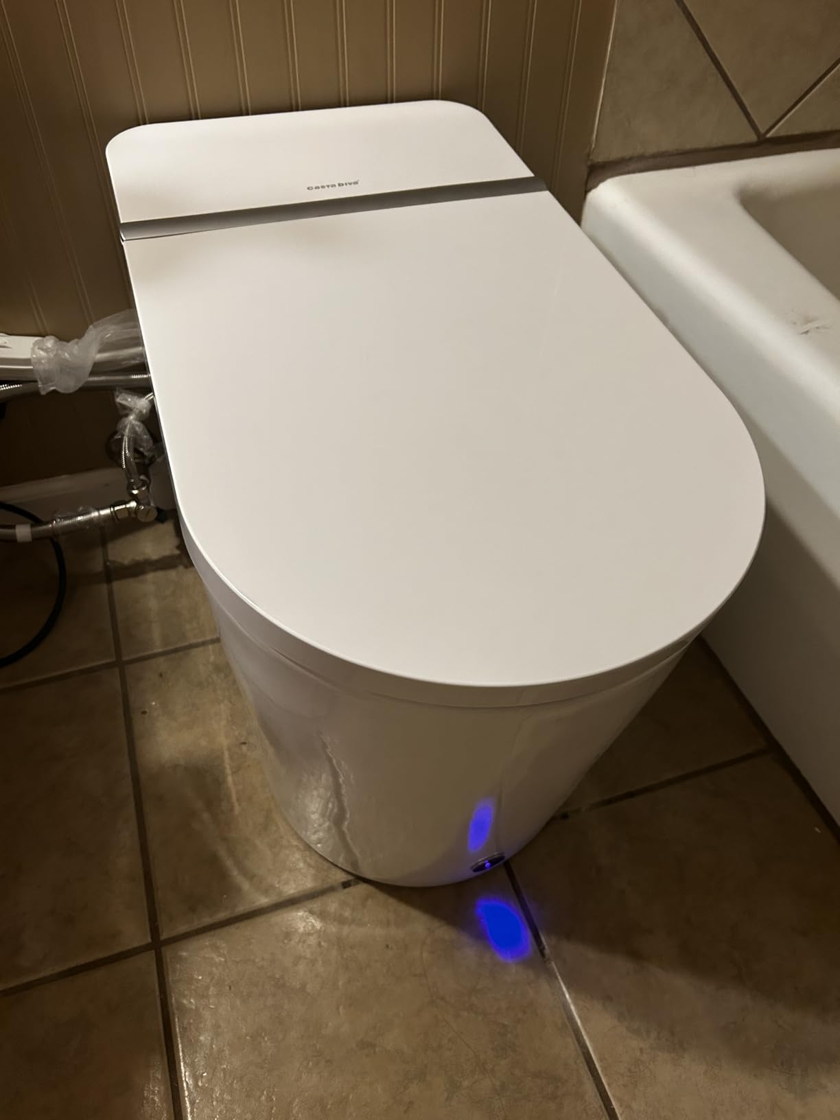 Casta Diva Smart Toilet, Wider Bidet with Heated Seat, Auto Open/Close, Warm Water, Foot Sensor Auto Flushing, Modern Japanese Toilet for Bathroom with Remote Control 1.28GPF(CD-K010) Customer Review Casta Diva Smart Toilet, Wider Bidet with Heated Seat, Auto Open/Close, Warm Water, Foot Sensor Auto Flushing, Modern Japanese Toilet for Bathroom with Remote Control 1.28GPF(CD-K010) - Customer Photo 1