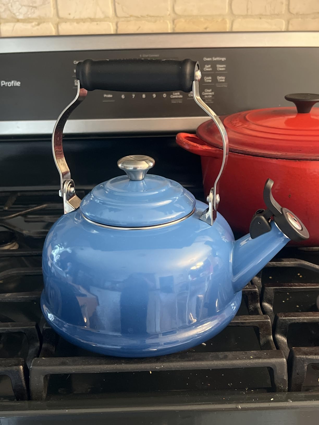 Le Creuset Enamel On Steel Whistling Tea Kettle with Metal Finishes, 1.7 qt., Cerise Customer Review Le Creuset Enamel On Steel Whistling Tea Kettle with Metal Finishes, 1.7 qt., Cerise - Customer Photo 2