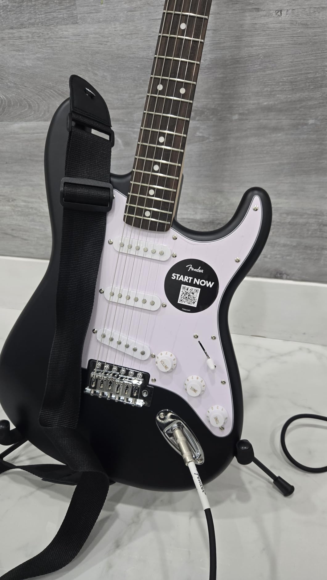 Fender Squier Debut Series Stratocaster Electric Guitar Kit, Beginner Guitar Kit, with 2-Year Warranty, with Padded Gig Bag, Frontman 10G Amp, Strap, and More, Includes Free Lessons, Black Customer Review Fender Squier Debut Series Stratocaster Electric Guitar Kit, Beginner Guitar Kit, with 2-Year Warranty, with Padded Gig Bag, Frontman 10G Amp, Strap, and More, Includes Free Lessons, Black - Customer Photo 2