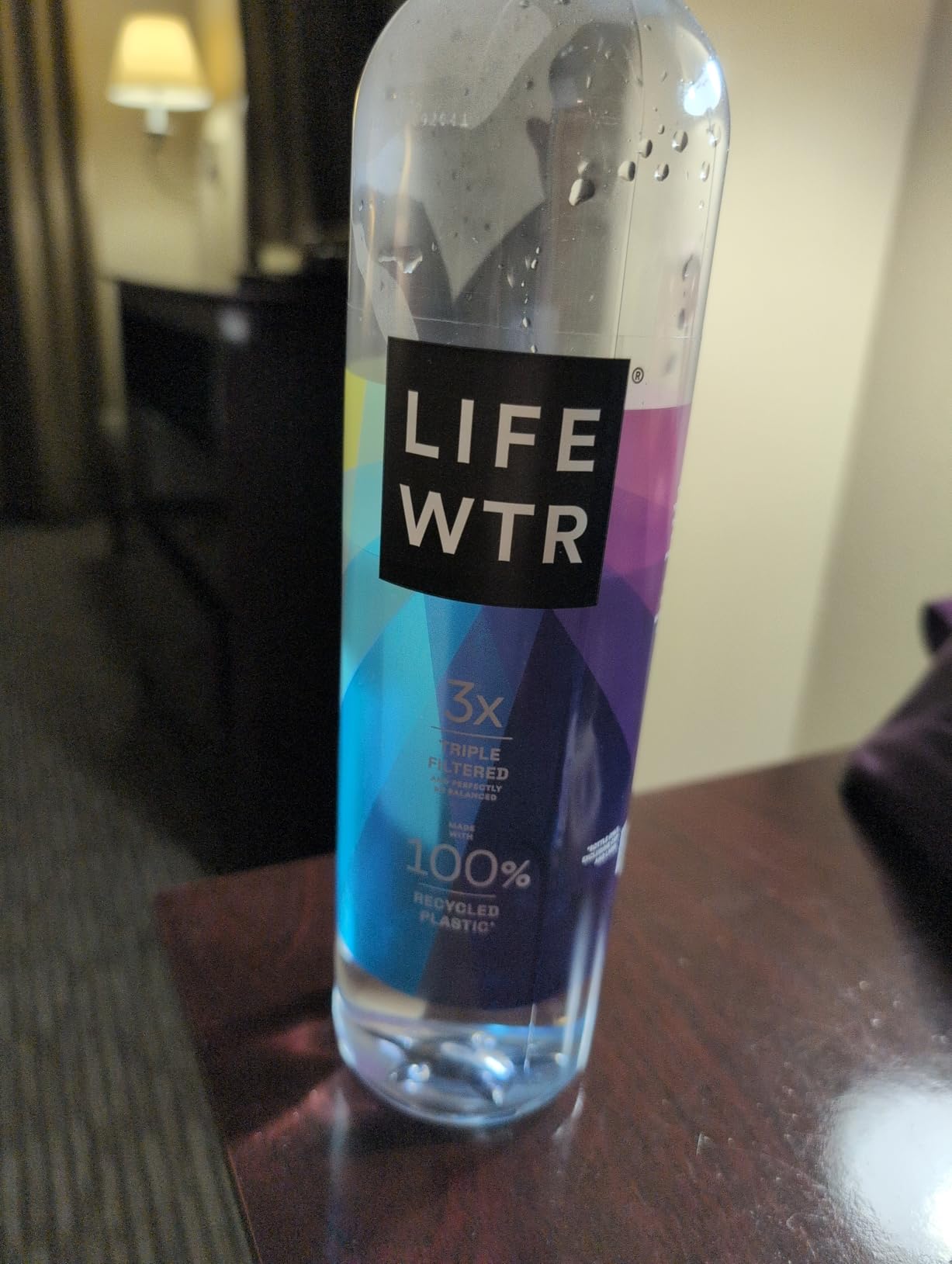 LIFEWTR Premium Purified Water, pH Balanced with Electrolytes, 100% recycled plastic bottles, 23.7 Fl Oz Flip Cap Bottles, 700 mL (Pack of 12) - Customer Photo 1