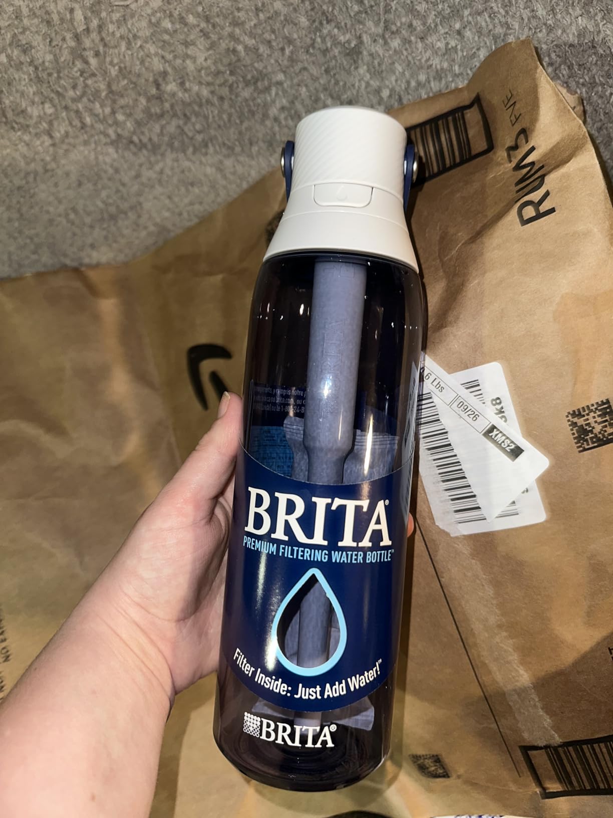 Brita Hard-Sided Plastic Premium Filtering Water Bottle, BPA-Free, Reusable, Replaces 300 Plastic Water Bottles, Filter Lasts 2 Months or 40 Gallons, Includes 1 Filter, Night Sky - 26 oz. Customer Review Brita Hard-Sided Plastic Premium Filtering Water Bottle, BPA-Free, Reusable, Replaces 300 Plastic Water Bottles, Filter Lasts 2 Months or 40 Gallons, Includes 1 Filter, Night Sky - 26 oz. - Customer Photo 1