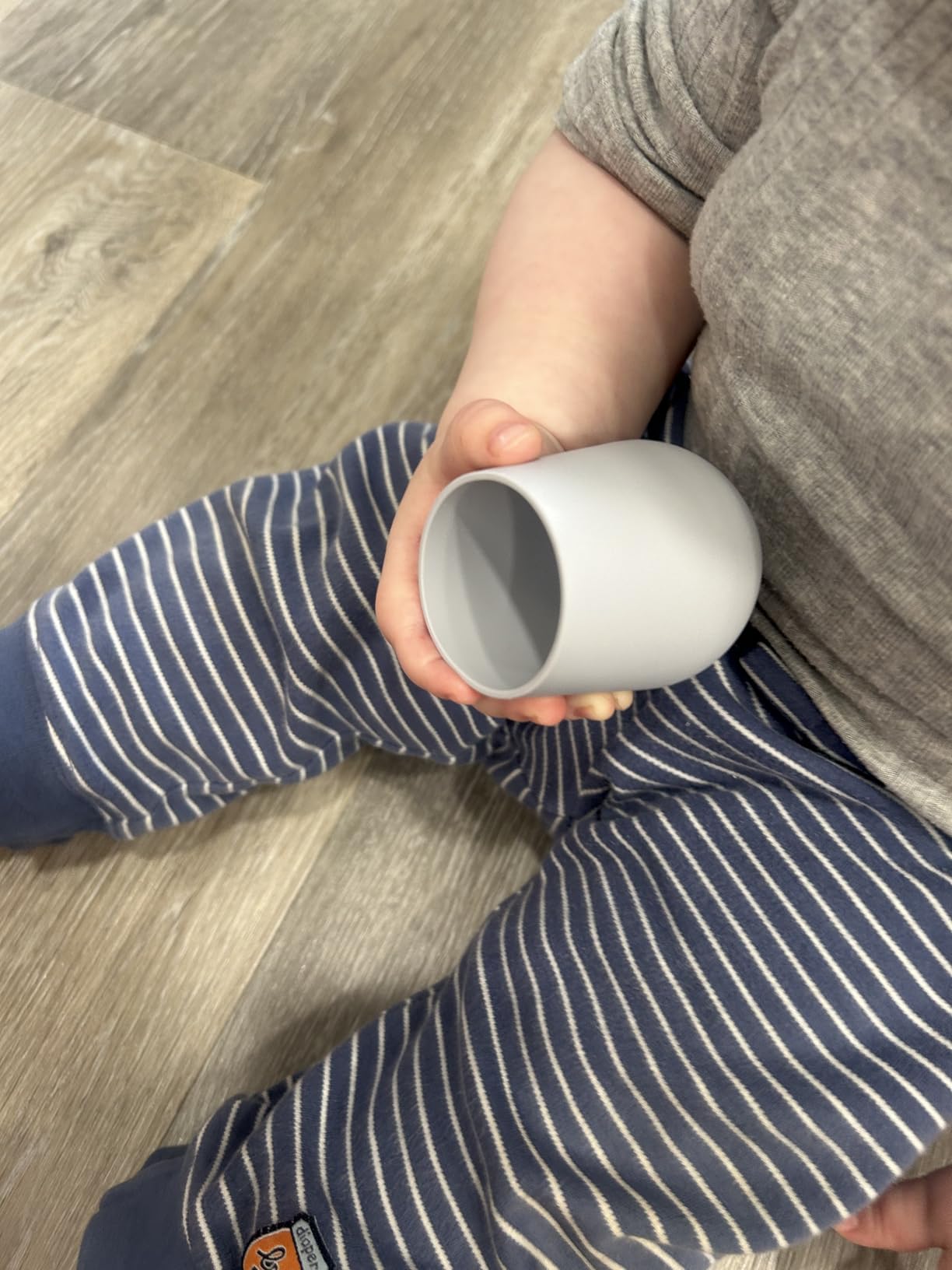 ezpz Tiny Cup (Blue) - 4 months+ - 100% Silicone Training Cup for Infants - Designed by a Pediatric Feeding Specialist - Baby-Led Weaning Essentials & Baby Gifts Customer Review ezpz Tiny Cup (Blue) - 4 months+ - 100% Silicone Training Cup for Infants - Designed by a Pediatric Feeding Specialist - Baby-Led Weaning Essentials & Baby Gifts - Customer Photo 1