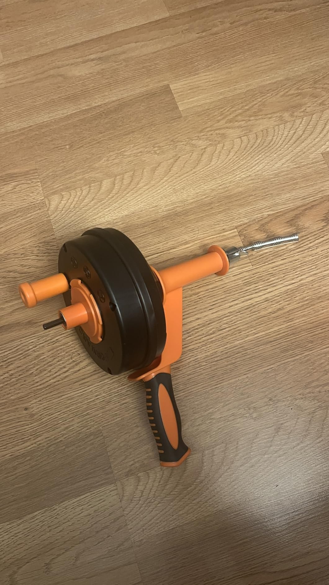 Drain Auger, Clog Remover with Drill Adapter, 25 Feet Flexible Plumbing Snake Use Manually or Powered for Kitchen,Bathrom and Shower Sink, Comes with Gloves (orange) Customer Review Drain Auger, Clog Remover with Drill Adapter, 25 Feet Flexible Plumbing Snake Use Manually or Powered for Kitchen,Bathrom and Shower Sink, Comes with Gloves (orange) - Customer Photo 1