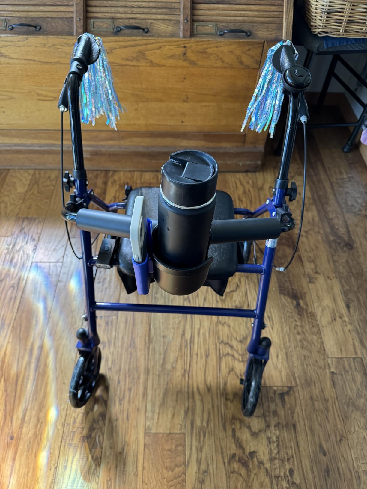 Accmor 2-in-1 Walker Cup Holder with Phone Holder, Wheelchair Cup Holder, Rollator Cup Holder, Cup Phone Holder for Walker, Wheelchair, Rollator, Mobility Scooter, Black Customer Review Accmor 2-in-1 Walker Cup Holder with Phone Holder, Wheelchair Cup Holder, Rollator Cup Holder, Cup Phone Holder for Walker, Wheelchair, Rollator, Mobility Scooter, Black - Customer Photo 1
