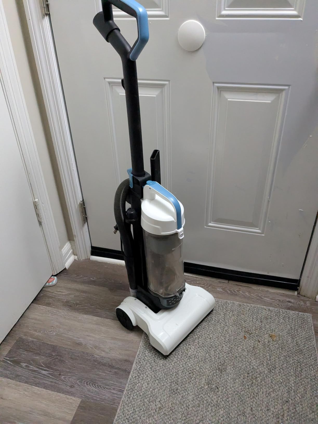 Amazon Basics Upright Bagless Vacuum Cleaner for Carpet and Hard Floors, With Crevice and Upholstery Tools, Detachable Handle, Lightweight (8.4 lbs), 1.7L Dust Cup, 720W, 25ft Cord, Black/White Customer Review Amazon Basics Upright Bagless Vacuum Cleaner for Carpet and Hard Floors, With Crevice and Upholstery Tools, Detachable Handle, Lightweight (8.4 lbs), 1.7L Dust Cup, 720W, 25ft Cord, Black/White - Customer Photo 2