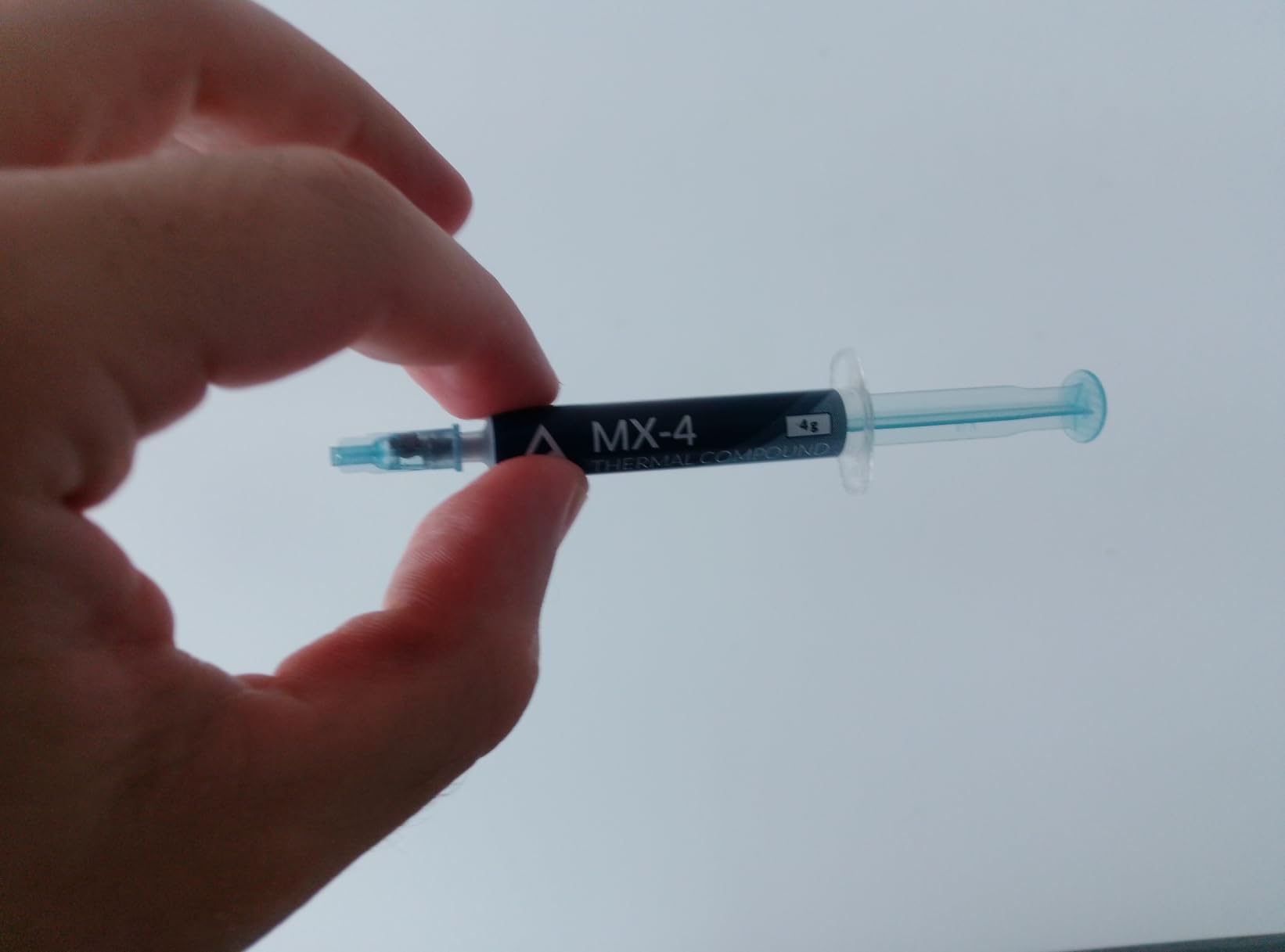 ARCTIC MX-4 (4 g) - Premium Performance Thermal Paste for All Processors (CPU, GPU - PC), Very high Thermal Conductivity, Long Durability, Safe Application, Non-Conductive Customer Review ARCTIC MX-4 (4 g) - Premium Performance Thermal Paste for All Processors (CPU, GPU - PC), Very high Thermal Conductivity, Long Durability, Safe Application, Non-Conductive - Customer Photo 1